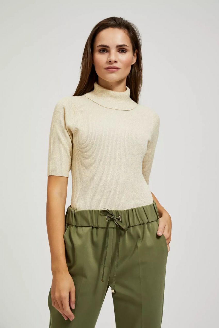 Turtleneck sweater decorated with metallic thread