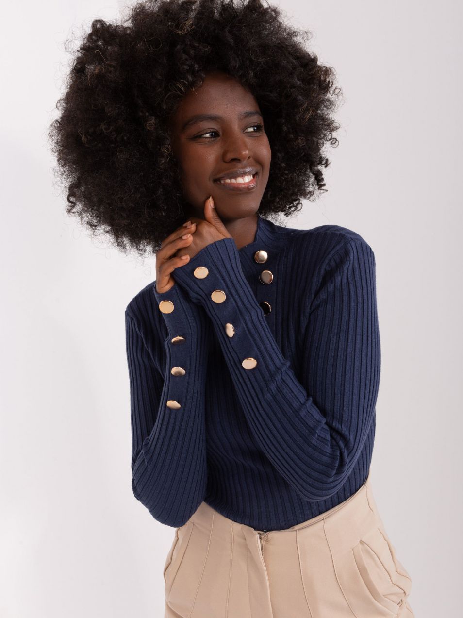 Navy blue fitted sweater with gold buttons