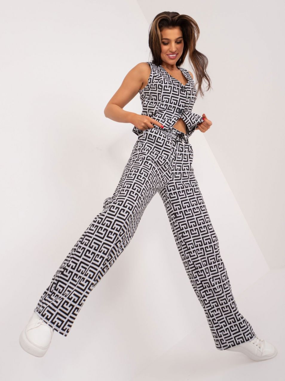 Grey and black fabric trousers with straight legs