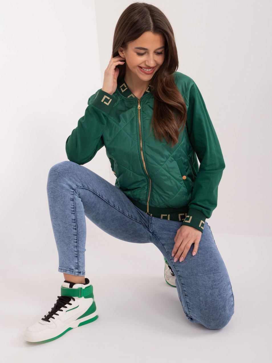 Green bomber jacket with decorative cuffs