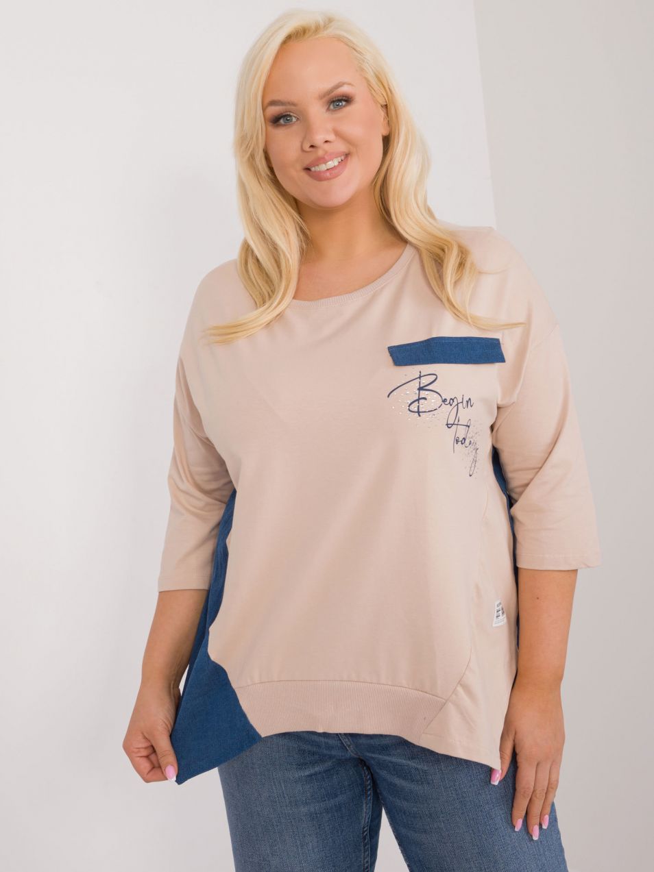 Beige women's blouse in a larger size with 3/4 sleeves