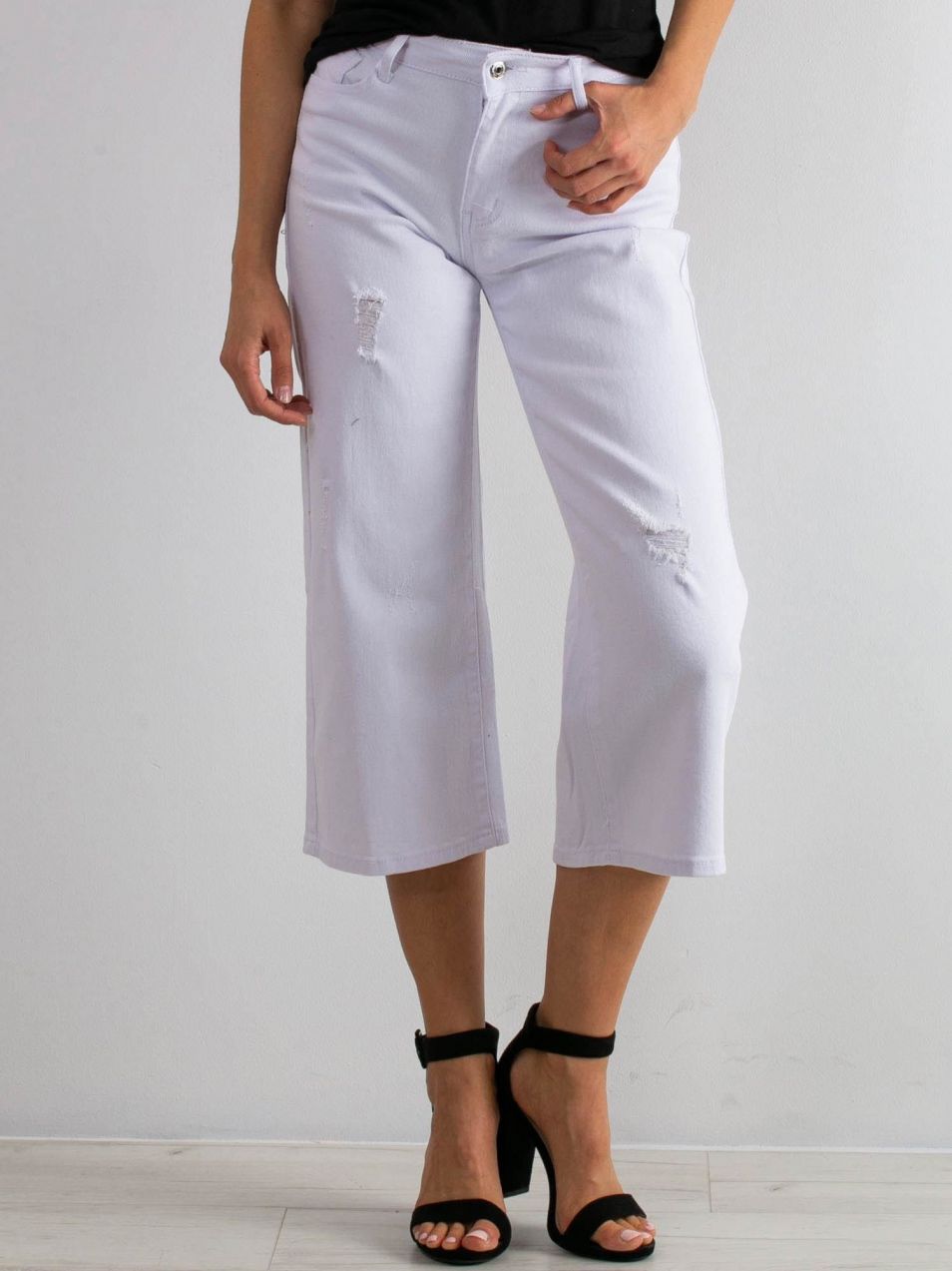 Ripped white jeans