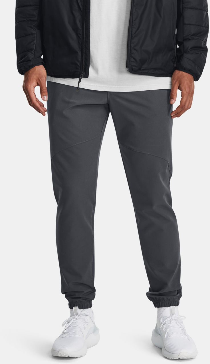 Tmavosivé športové tepláky Under Armour UA Stretch Woven CW Jogger