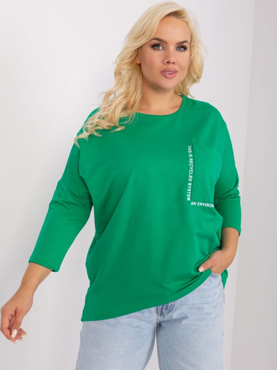 Green women's plus size blouse with a longer back