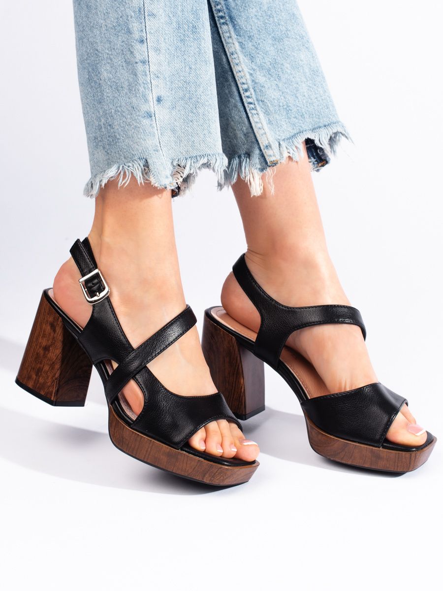Black sandals with a wide heel by Sergio Leone