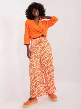 Orange wide trousers with SUBLEVEL print