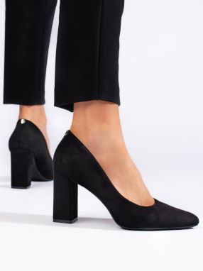Black suede pumps on a thick heel by Sergio Leone