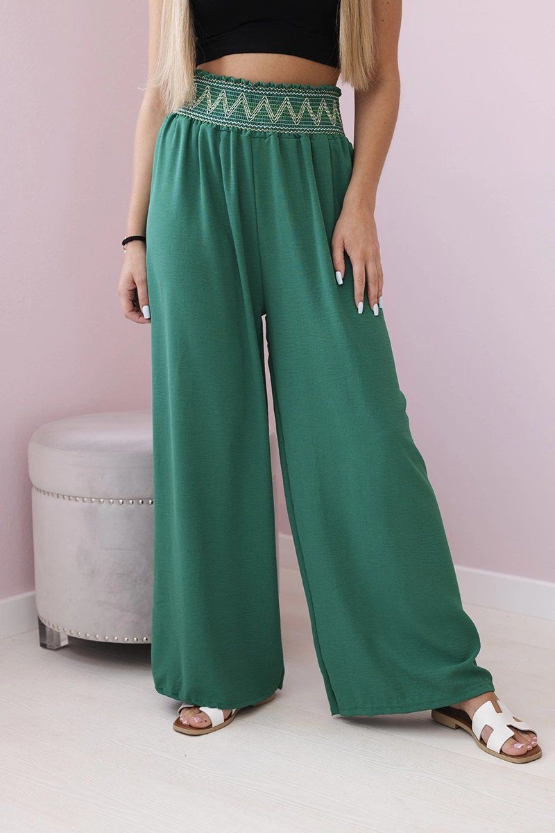 Trousers with a wide elastic waistband in green colour