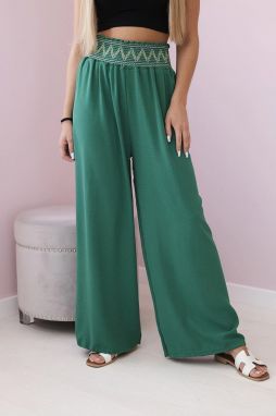 Trousers with a wide elastic waistband in green colour