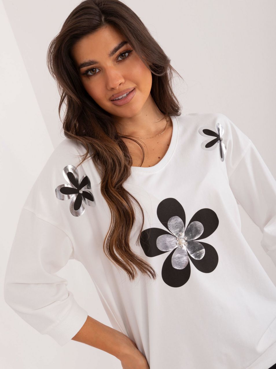 Ecru women's blouse with shiny print