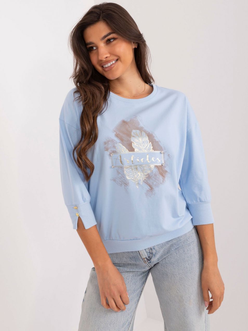 Light blue casual blouse with a slit on the sleeve
