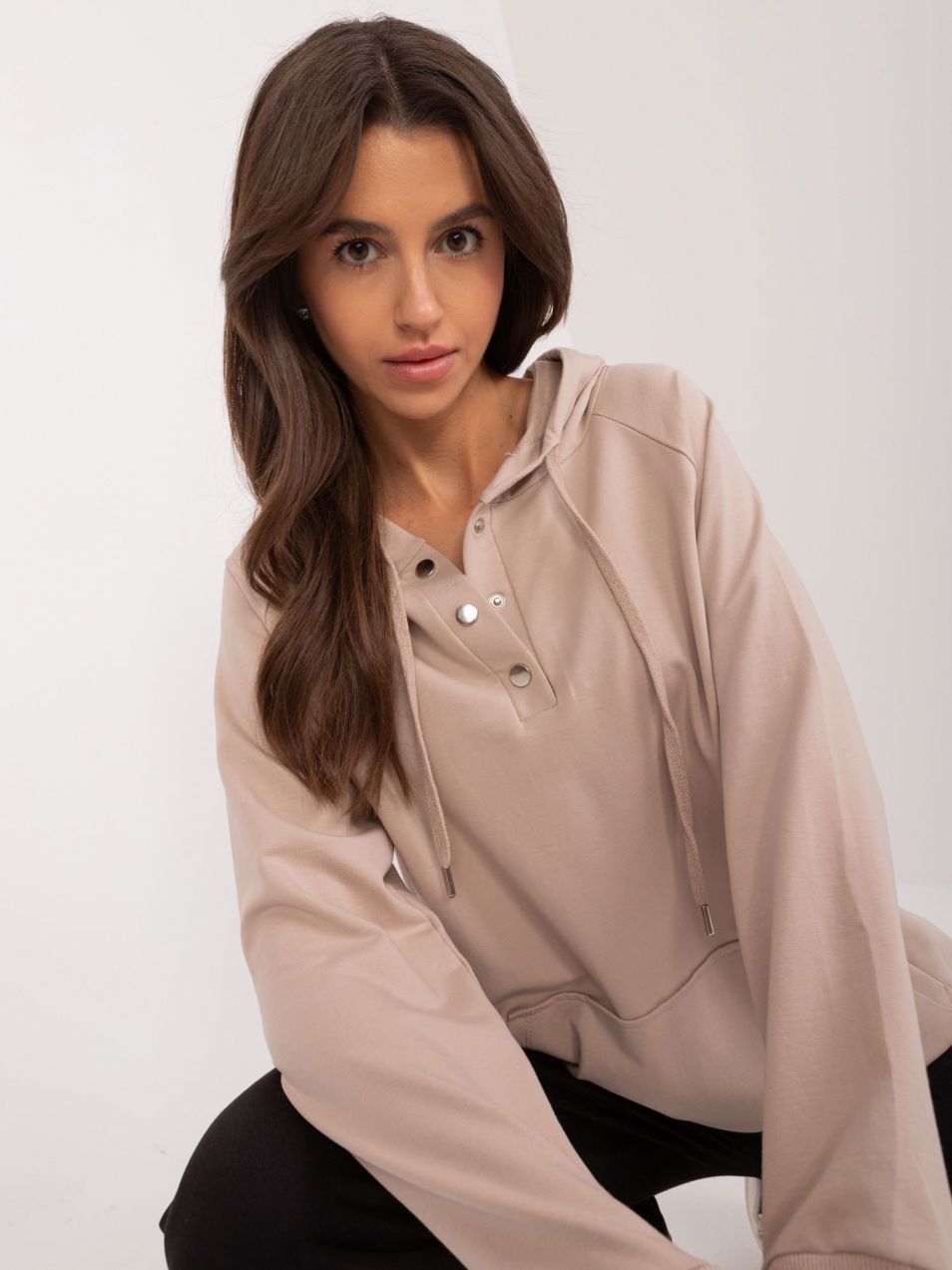 Beige women's kangaroo sweatshirt with drawstring