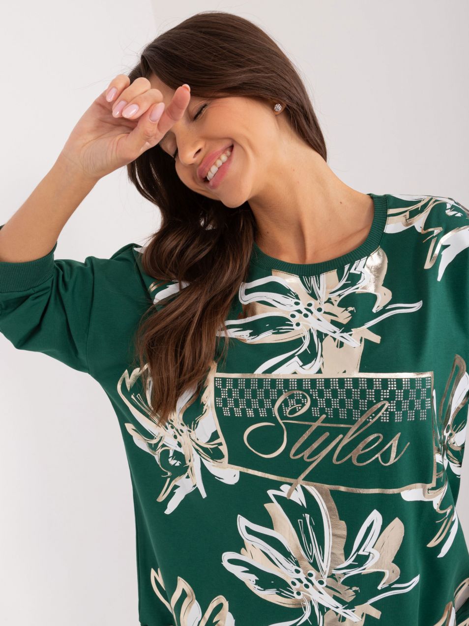 Dark green women's blouse with rhinestone appliqué