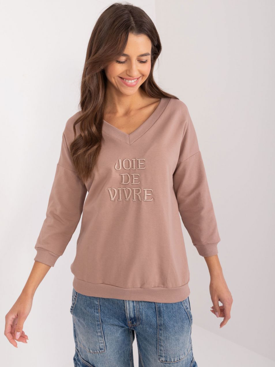 Dark beige women's blouse with a neckline
