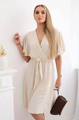 Women's dress with a plunging neckline - beige