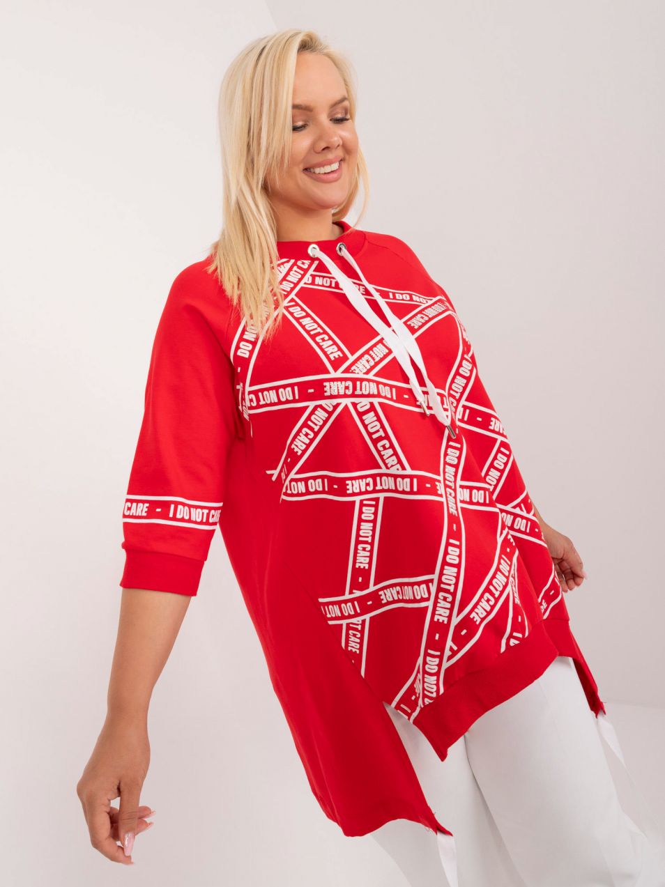 Red cotton blouse in a larger size with a longer back
