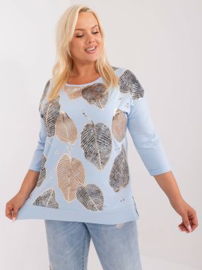 Light blue blouse of a larger size with a print of leaves