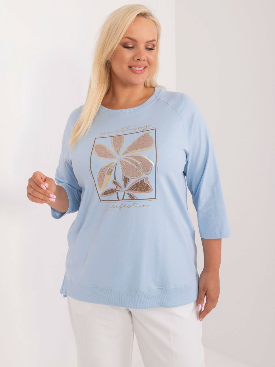 Light blue cotton blouse of larger size