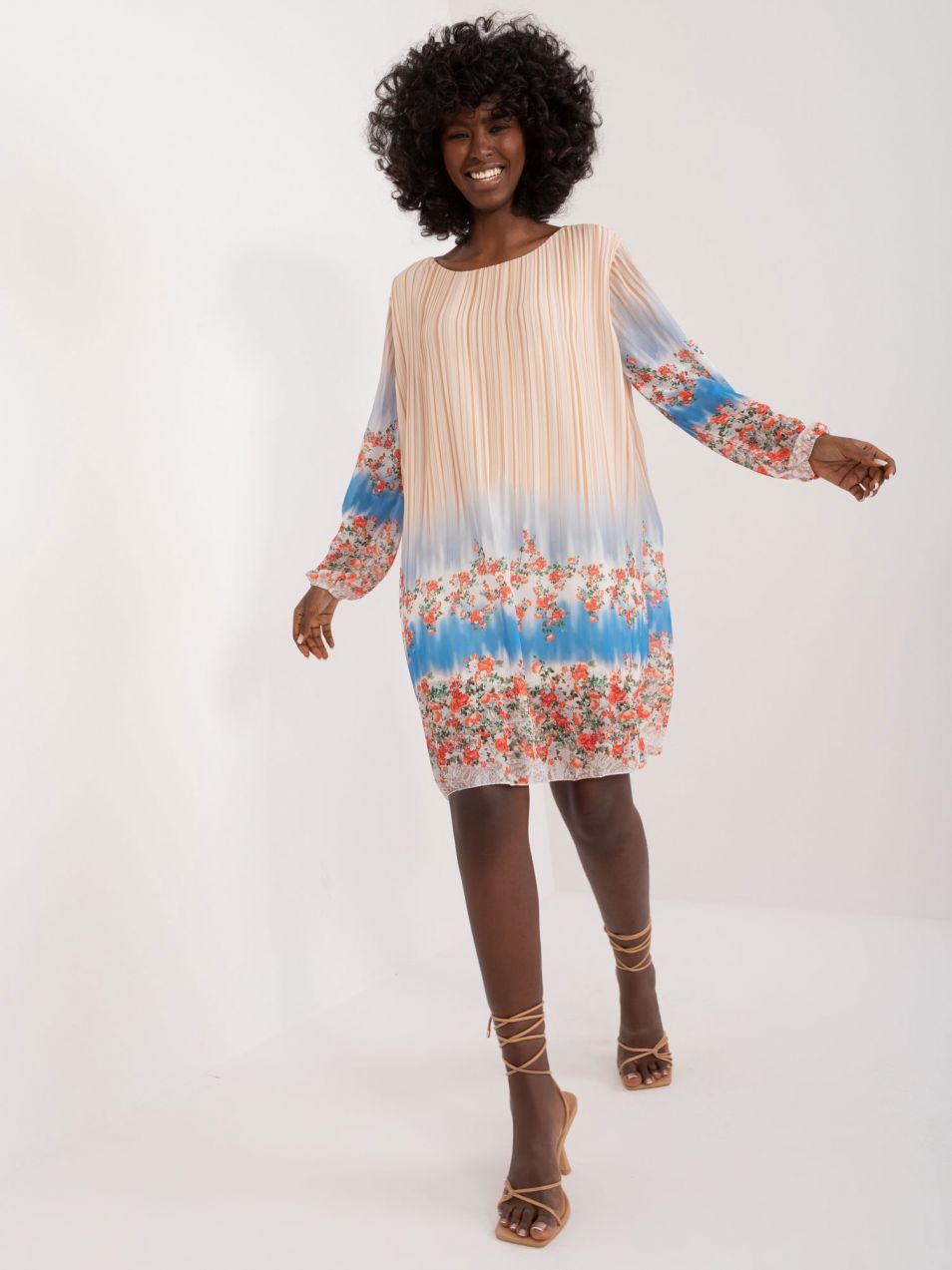 Beige women's dress with long sleeves