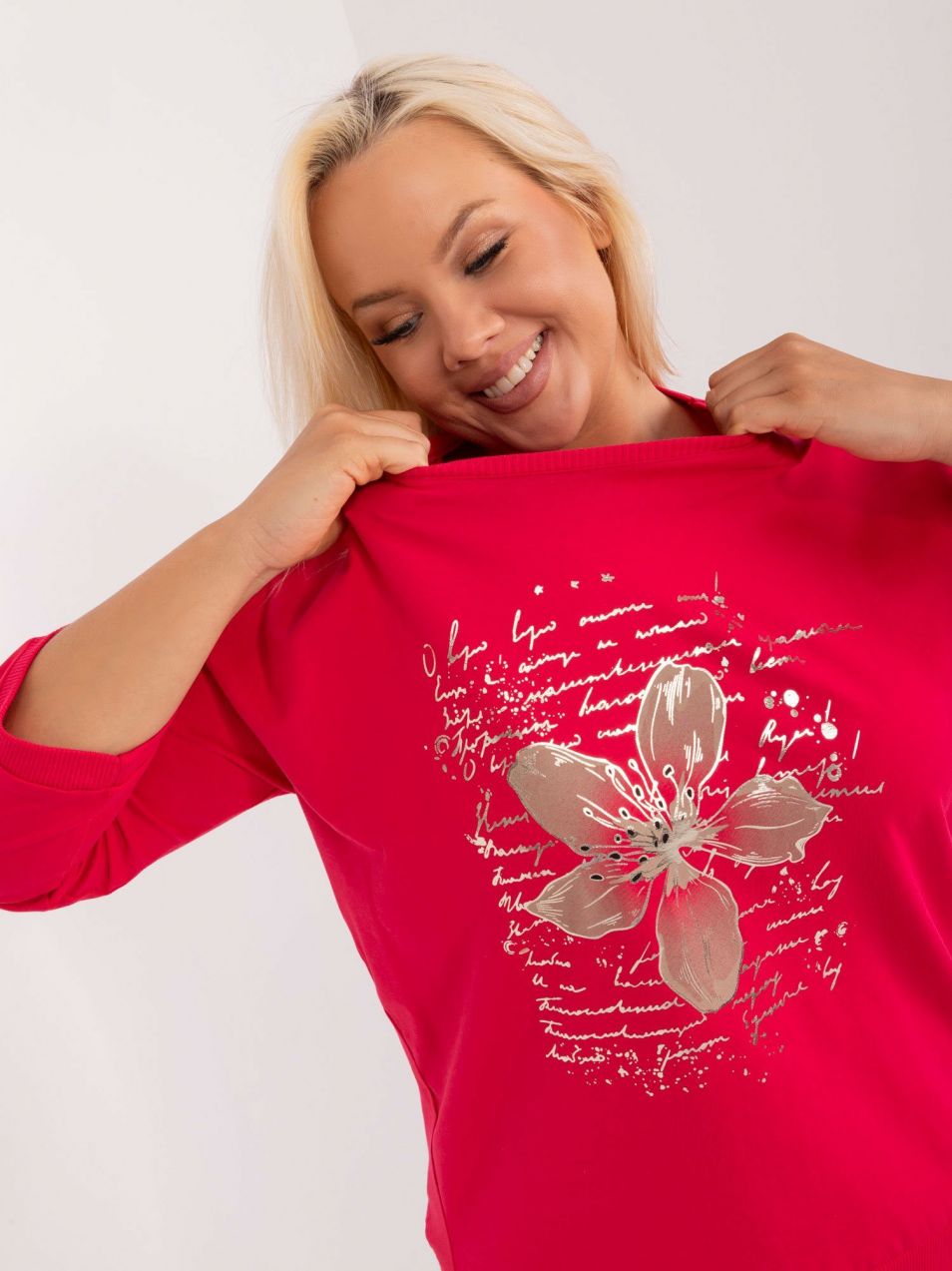 Red women's blouse with print and slits