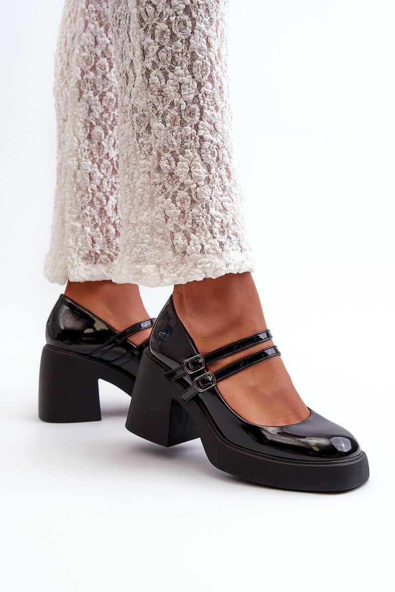 Black patented pumps with chunky heels from Halmina