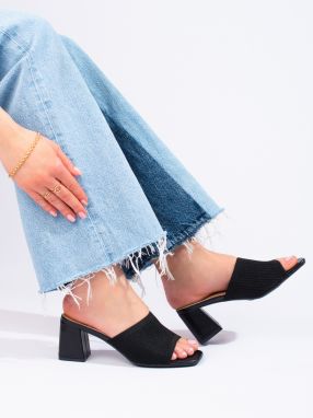 Textile women's black flip-flops on the Shelvt post