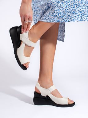 Comfortable white wedge sandals by Sergio Leone