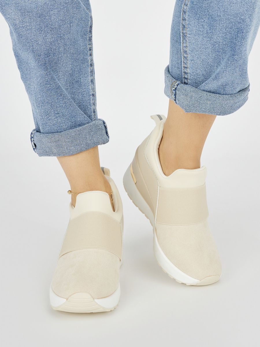 Shelvt Light beige women's sneakers on a wedge
