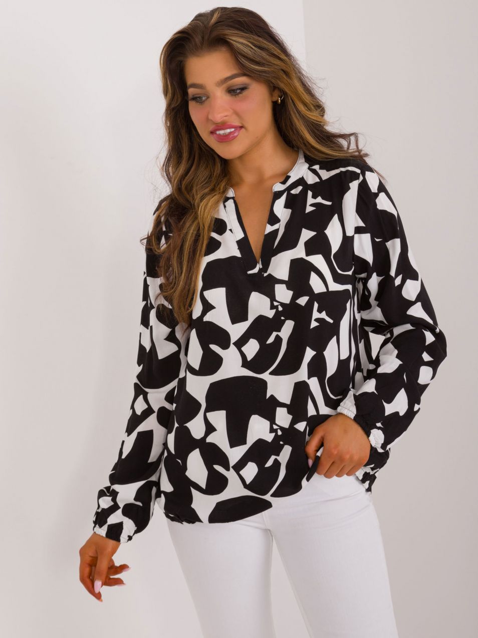 Black loose blouse with SUBLEVEL print