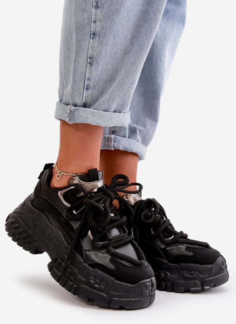 Women's sneakers on a solid sole black Nevela