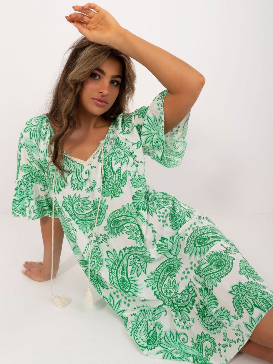 White and green dress with a tied neckline