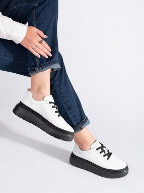 Shelvt White leather shoes on a black platform