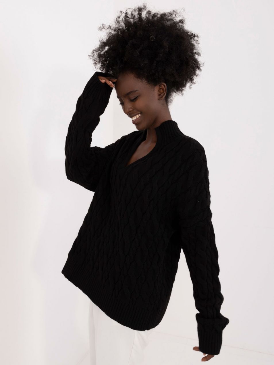 Black knitted sweater with long sleeves