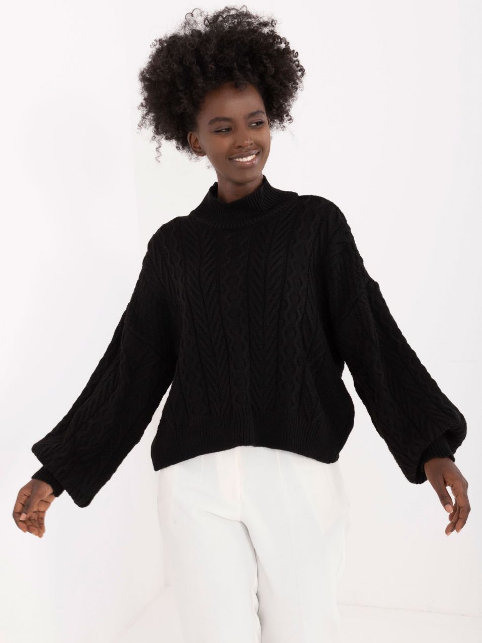 Black knitted sweater with cuffs