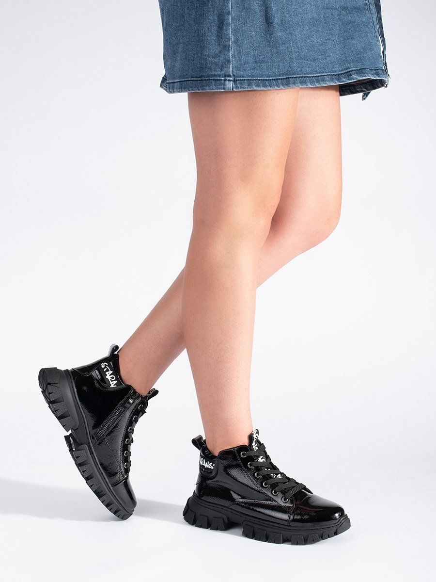 Lacquered black women's boots by Sergio Leone