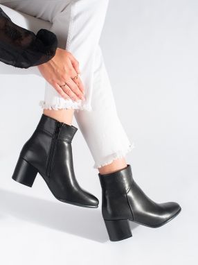 Black ankle boots on a block by Sergio Leone