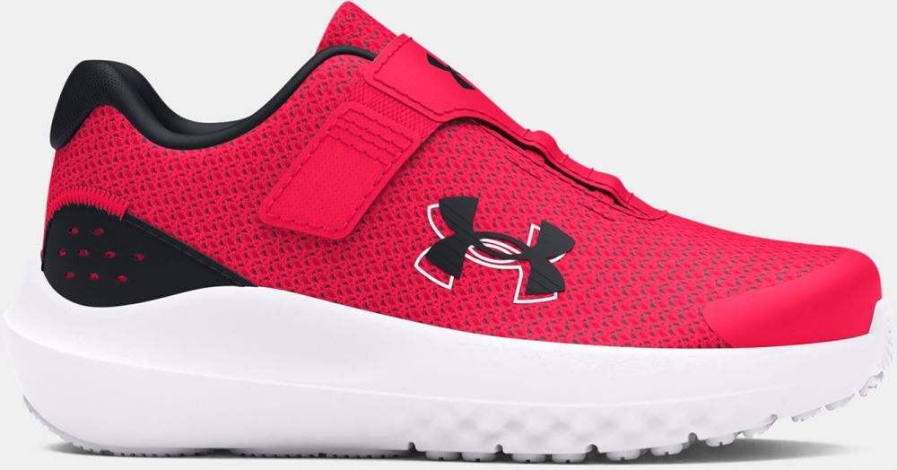 Červené športové tenisky Under Armour UA BINF Surge 4 AC