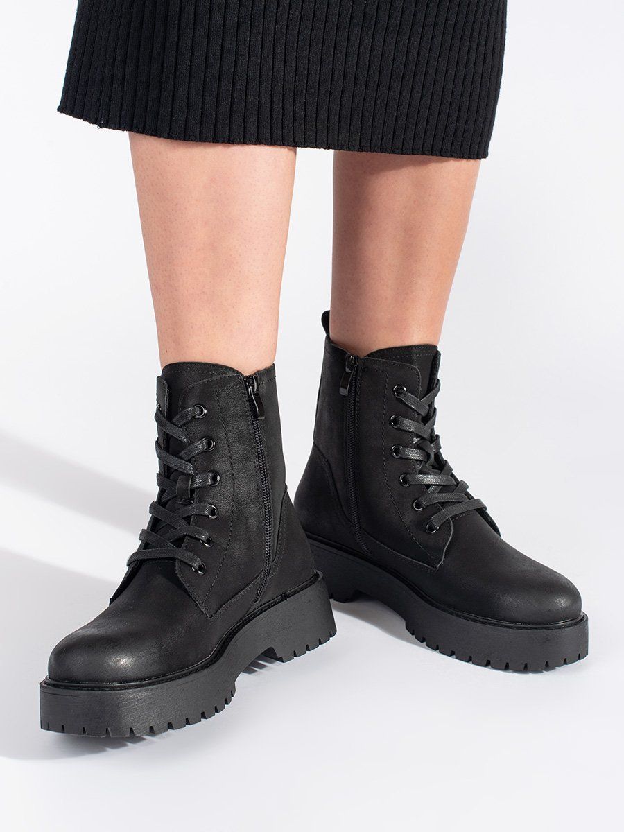Women's black platform hiking boots by Sergio Leone